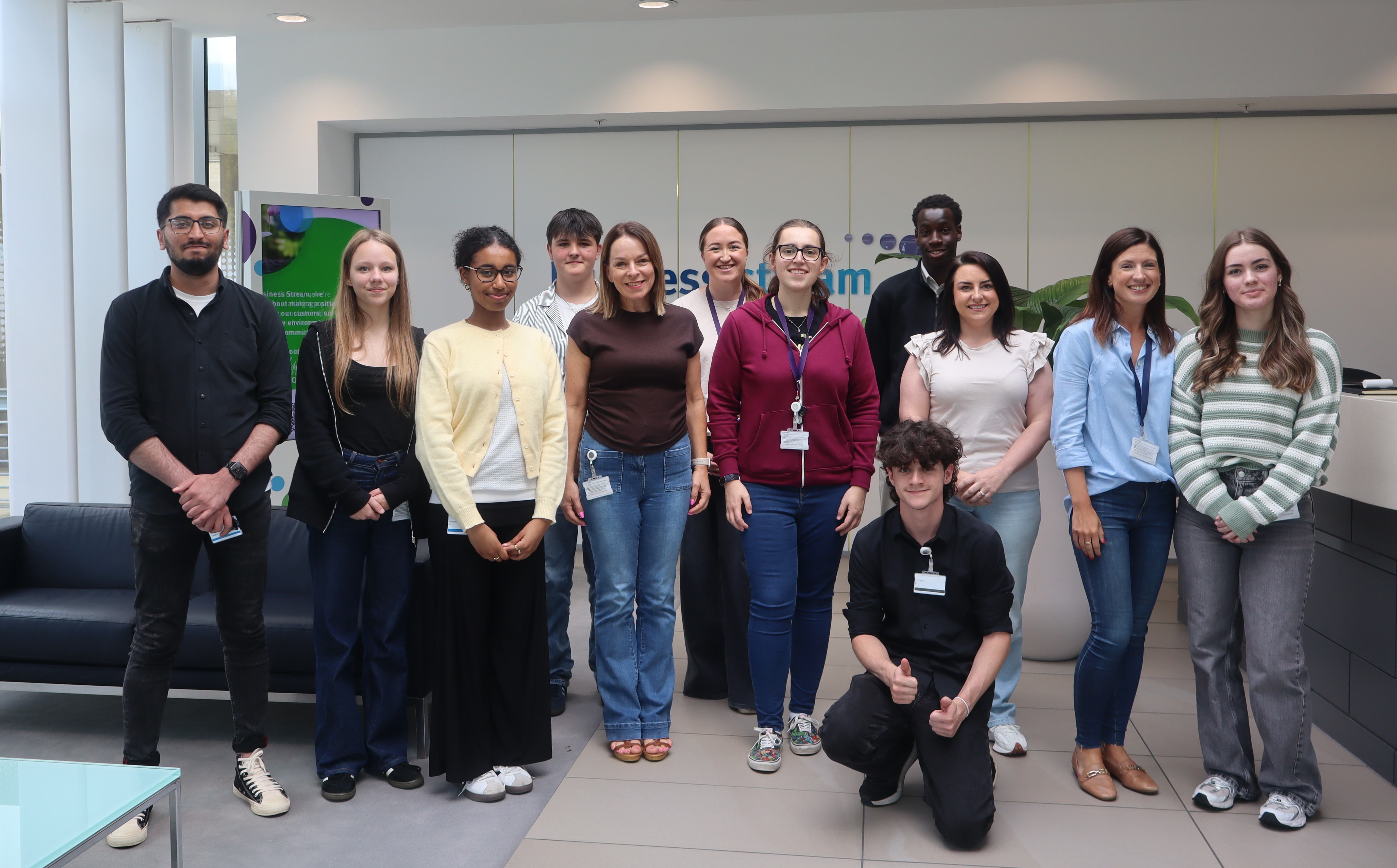 Group of young people and colleagues in reception