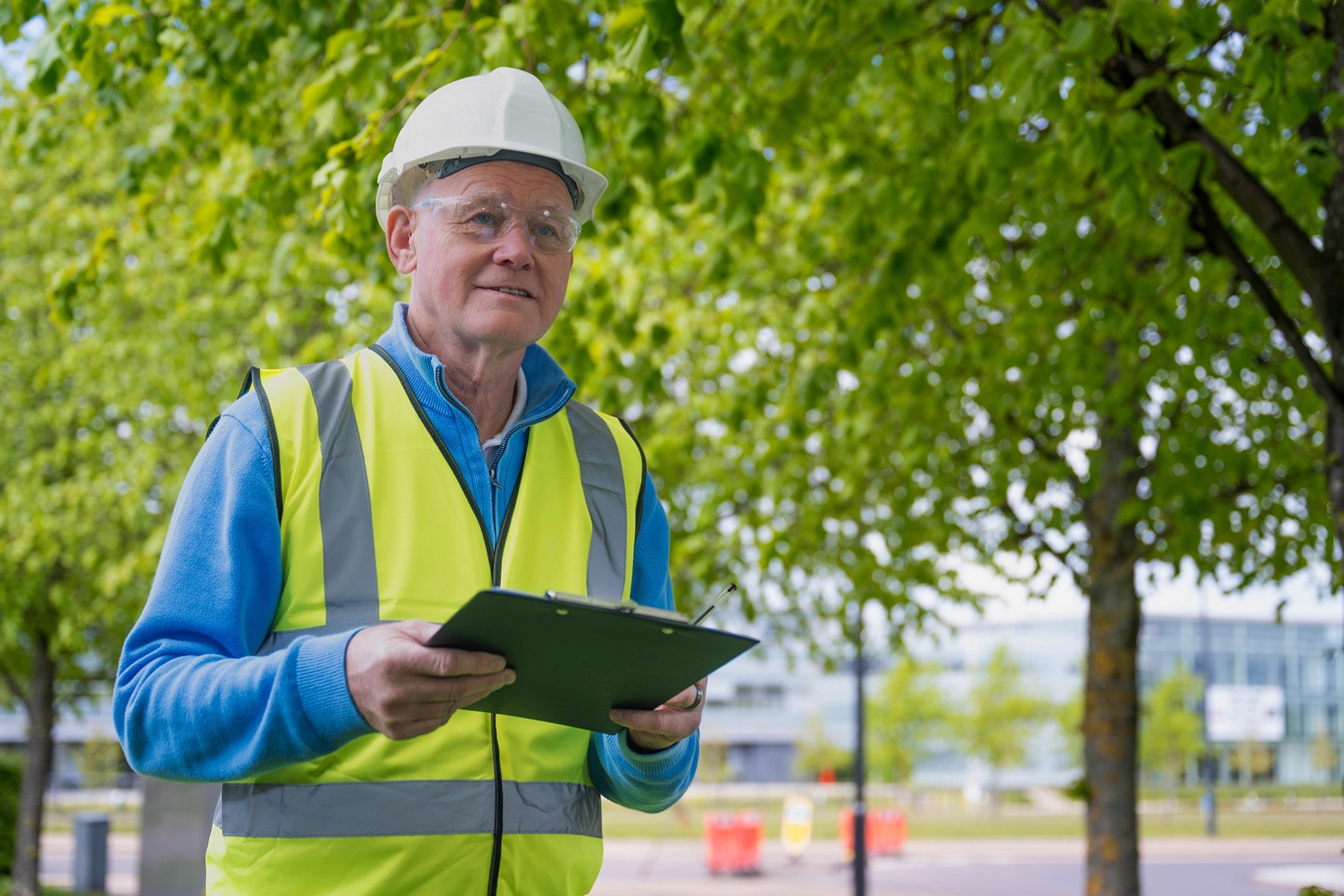 Auditor on site with clipboard