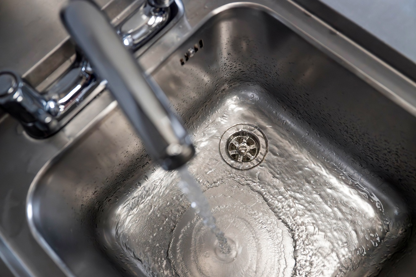 Tap running into empty sink