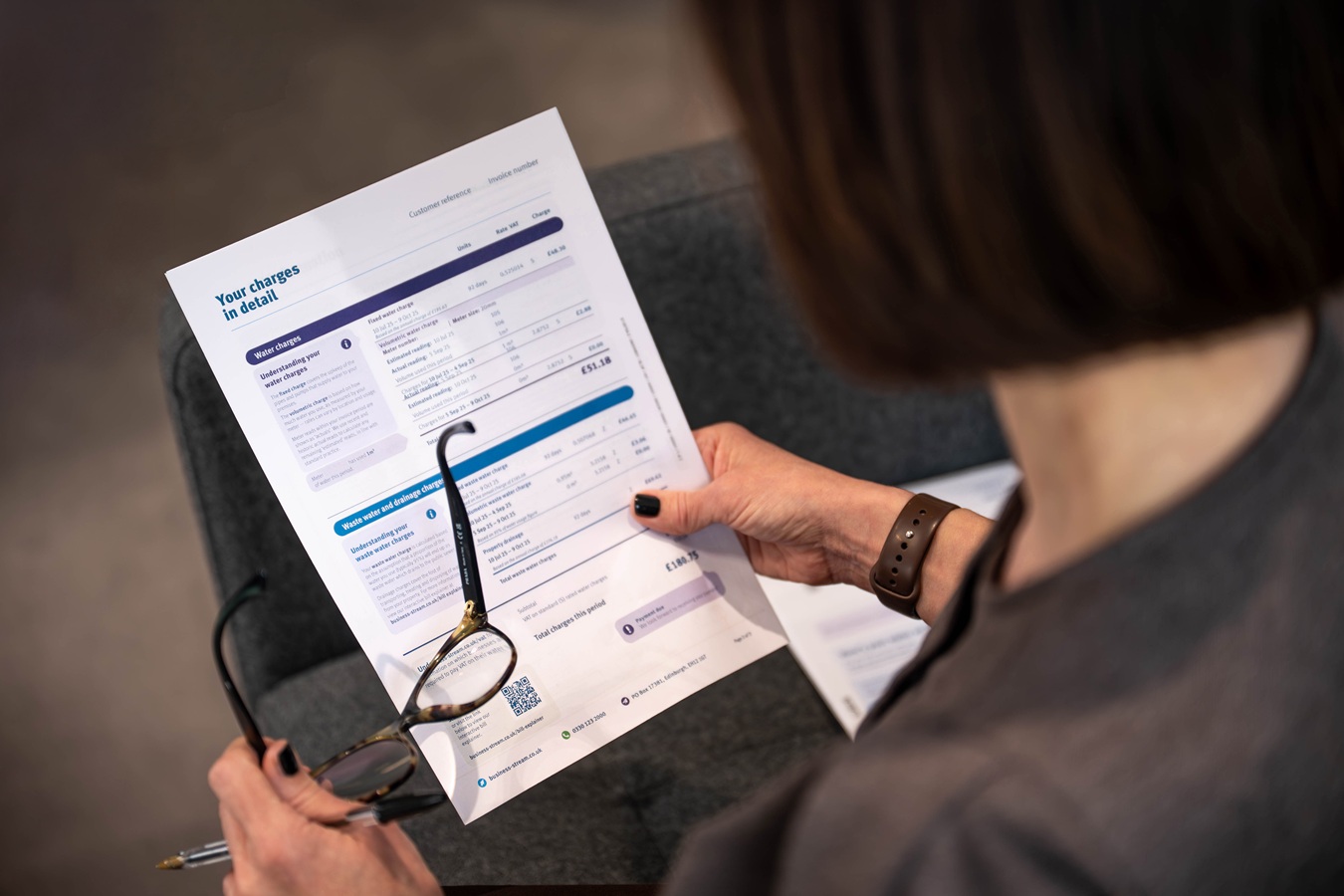 Woman examining her bill