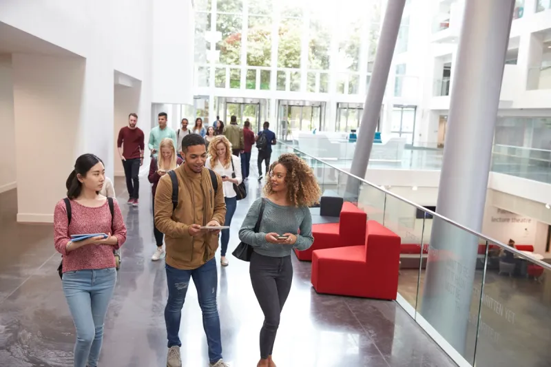 Students in University hall walking