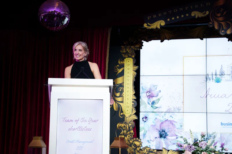 Business Stream CEO Jo Dow at lectern at Awards Night